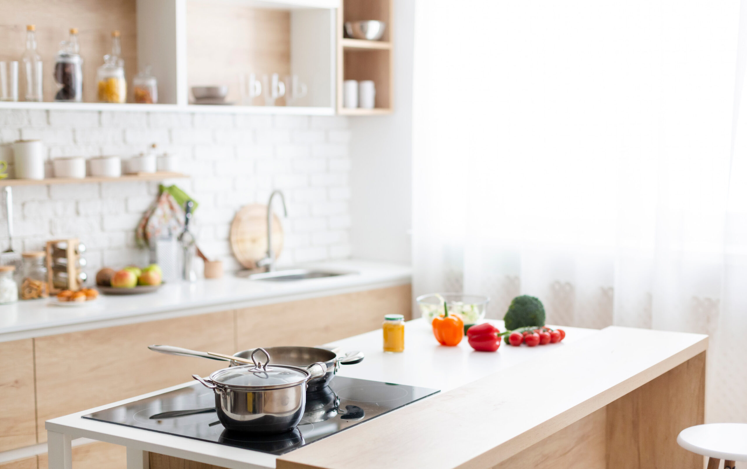 Modern kitchen interior at home with cooking dishes Modern kitchen interior at home with cooking dishes